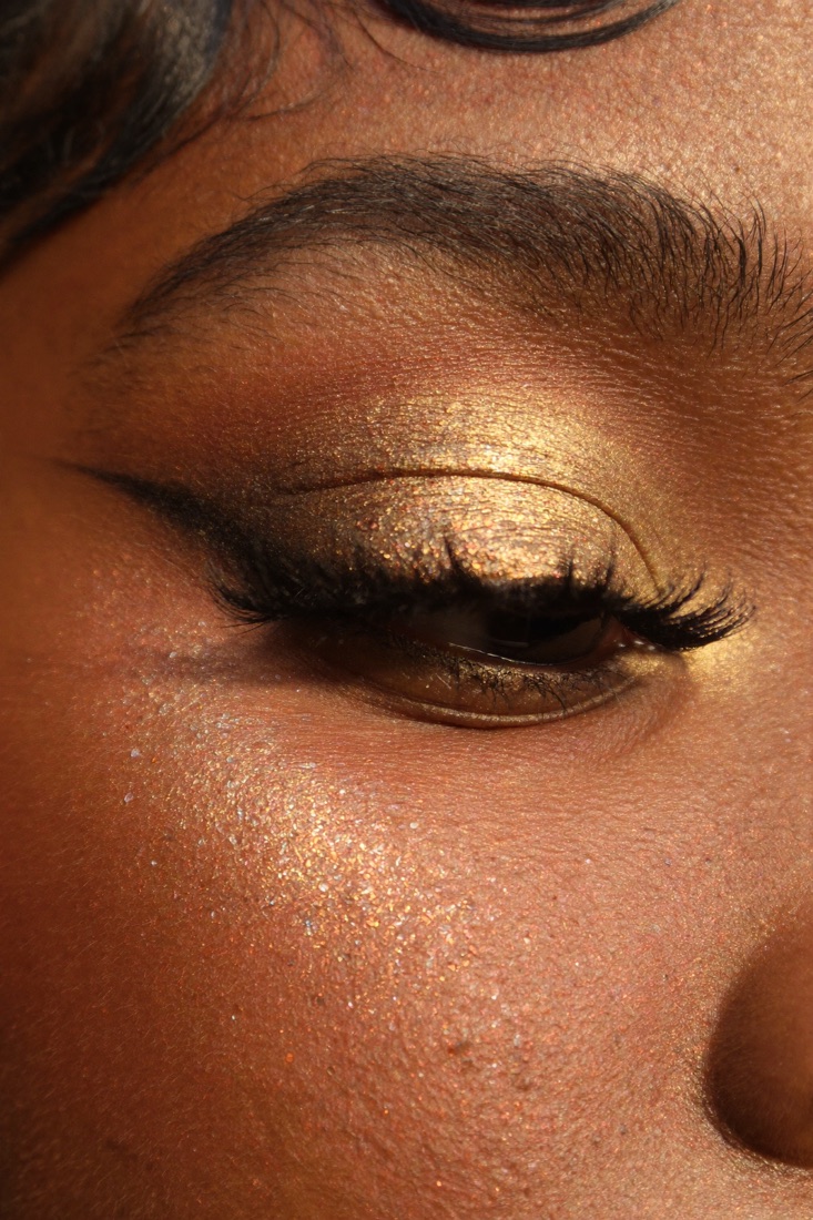 Close-up of bridal eye makeup with gold liner