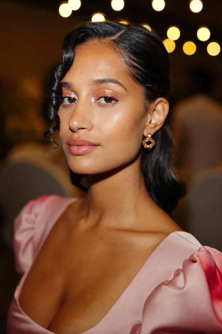 Rose gold party makeup with soft waves